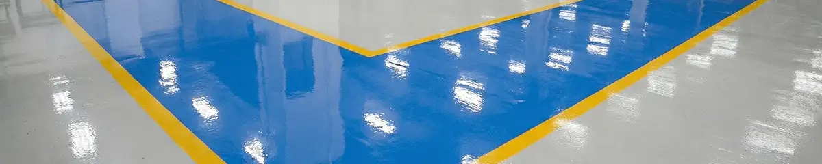 A factory floor professionally covered and marked with epoxy flooring in Duluth, MN