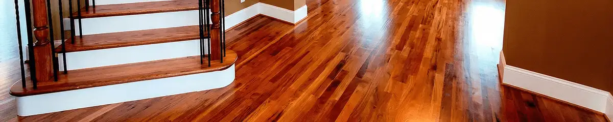 Base floor of a staircase with professionally restored wood flooring in Duluth MN