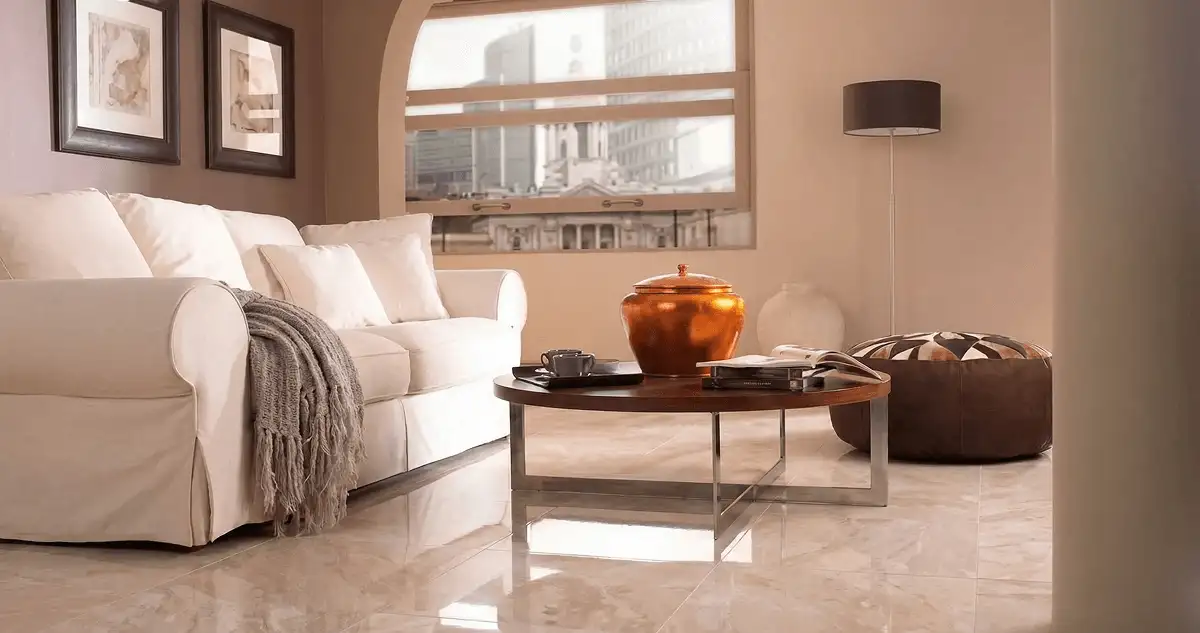 Modern living room with professionally installed marble flooring, a beige sofa, coffee table in Duluth, MN