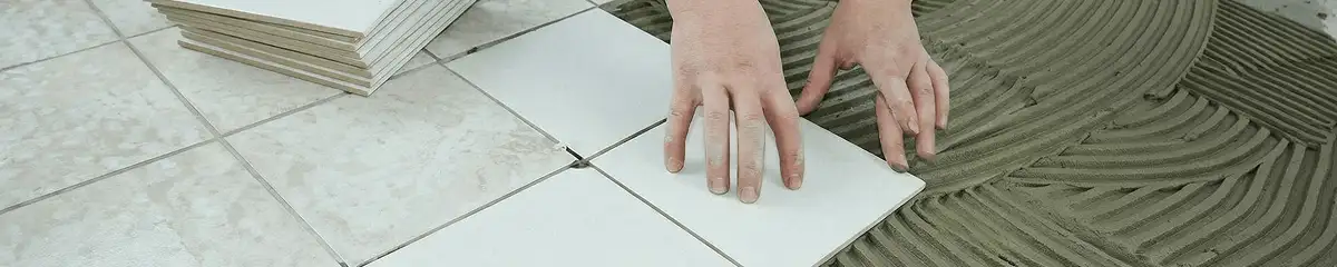 Professional installing white tile floors in Duluth, MN
