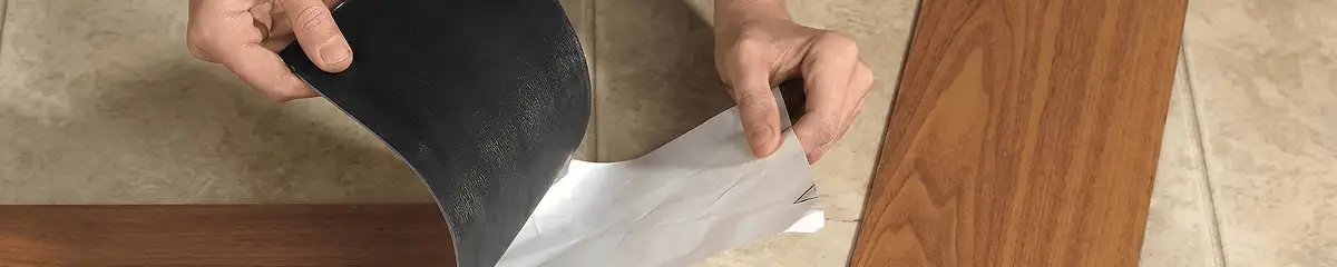 A professional installing vinyl flooring in Duluth, MN